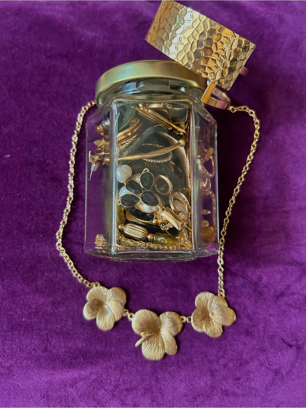 Gold toned mystery jewelry jar